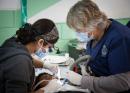 Irvine Rotarian Cisca Stellhorn assisting