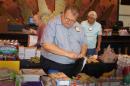President Bruce filling backpacks